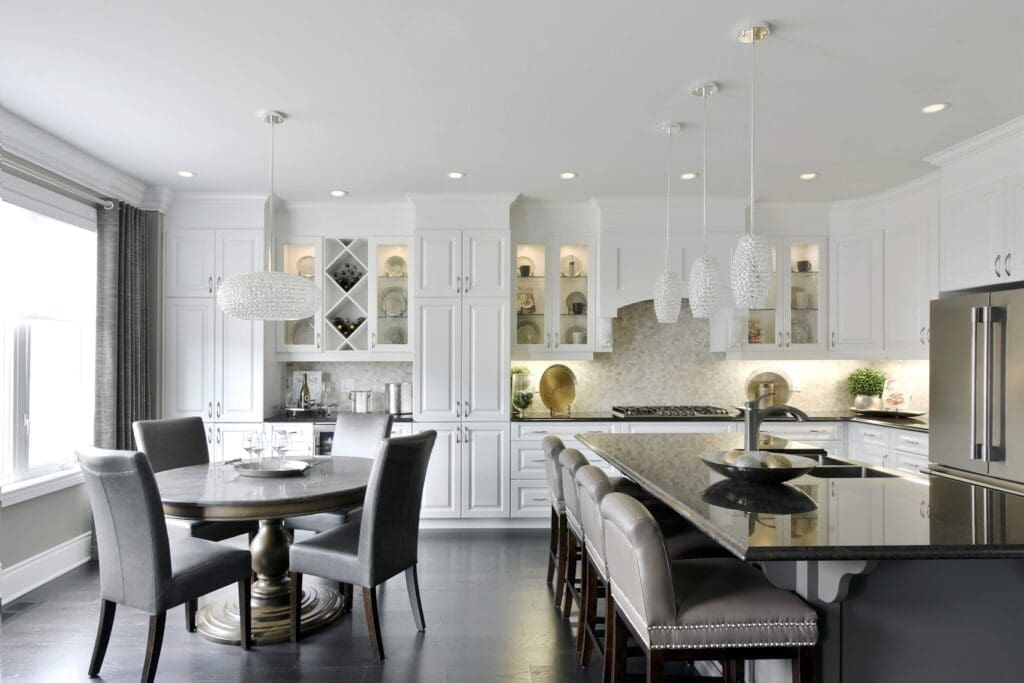 Custom white cabinets with glass door features